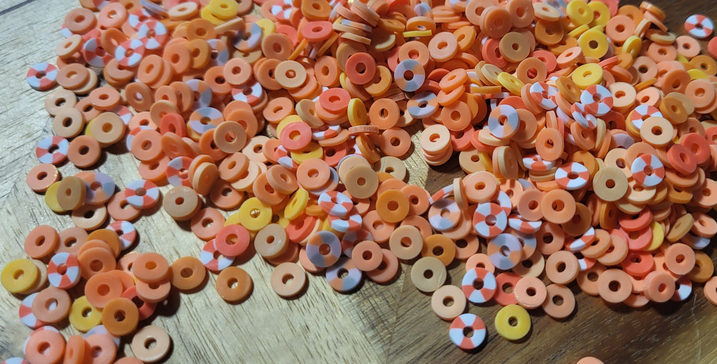 CLEARANCE Mixed Orange Spacer Beads